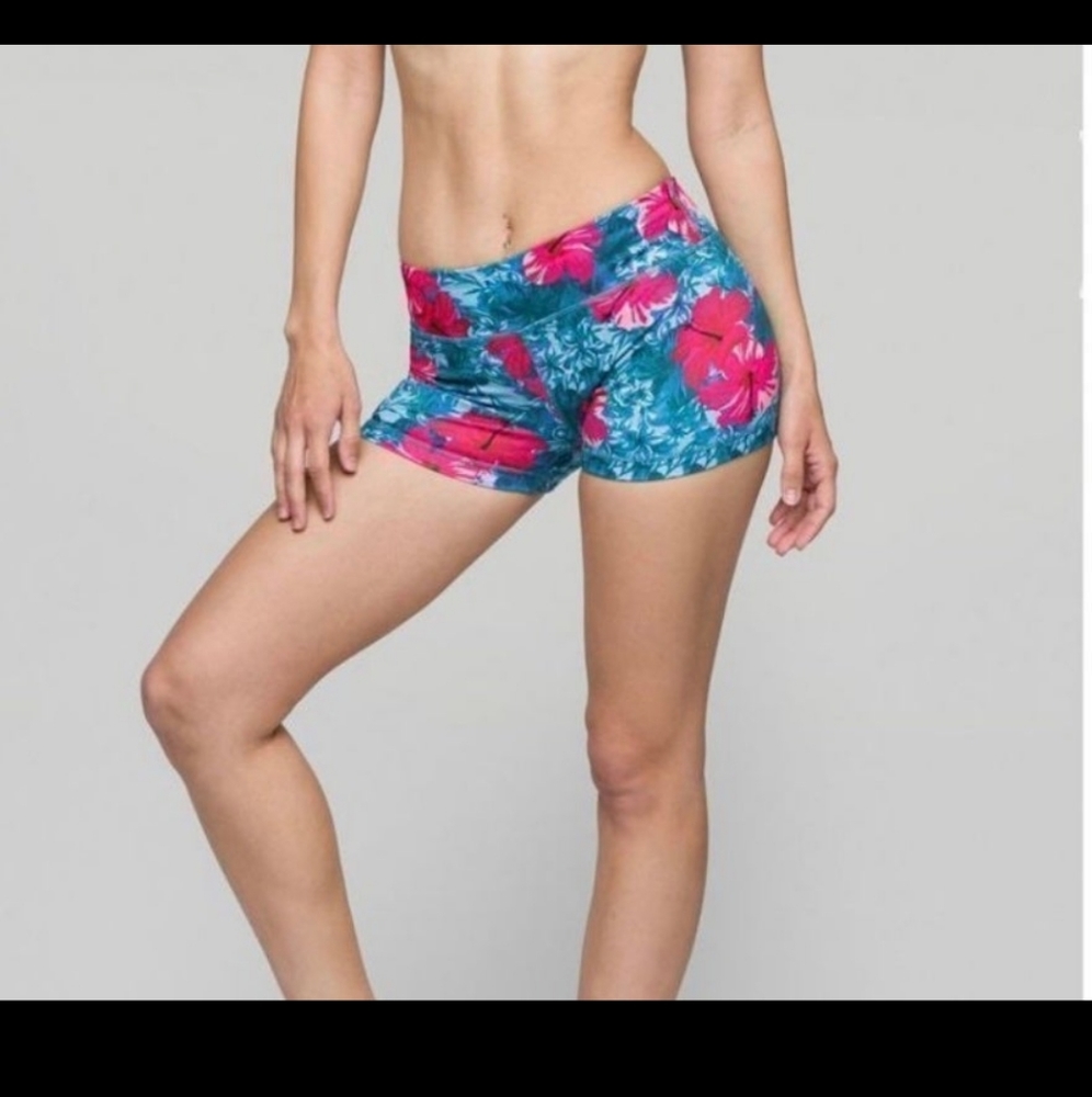 IAB MFG athletic shorts teal with hibiscus flowers